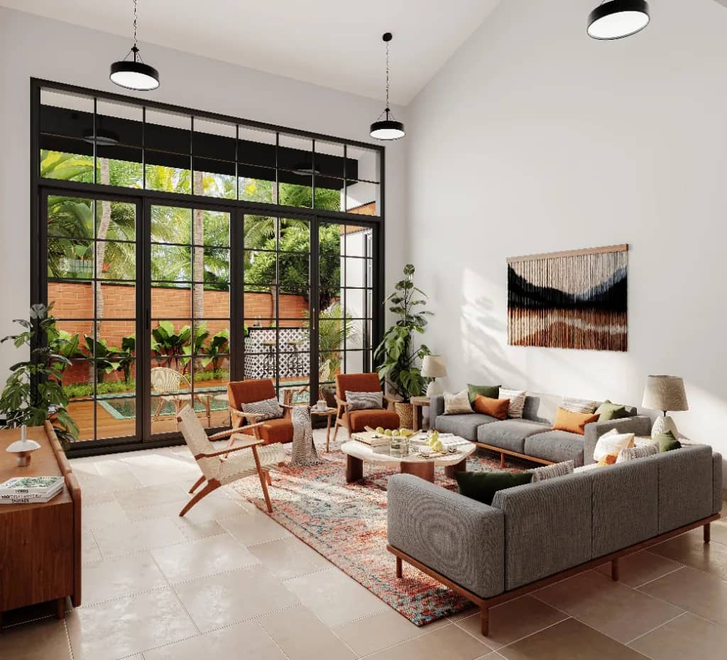 Living room of a North Goa villa, opening to garden light.